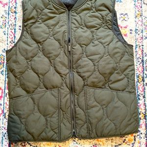 Men’s green quilted vest.